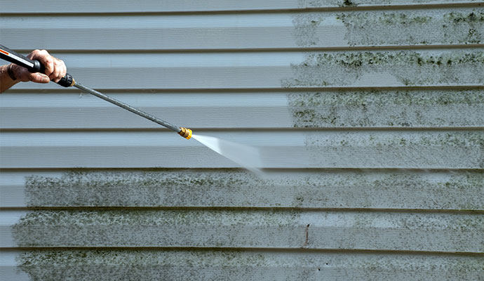 Collage image of soft washing and pressure washing