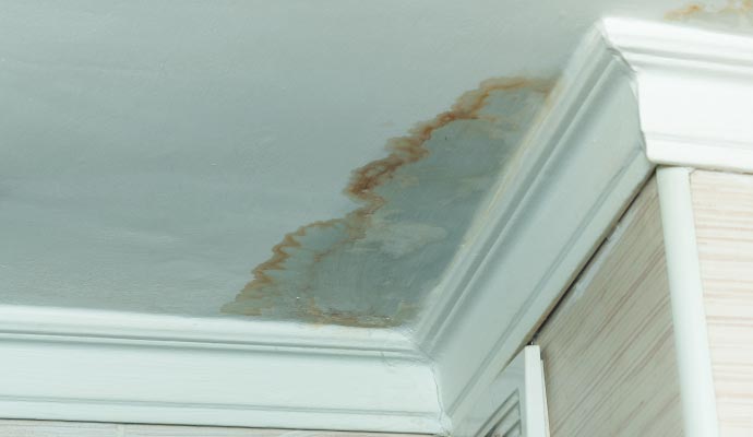 Water damaged ceiling due to roof leak