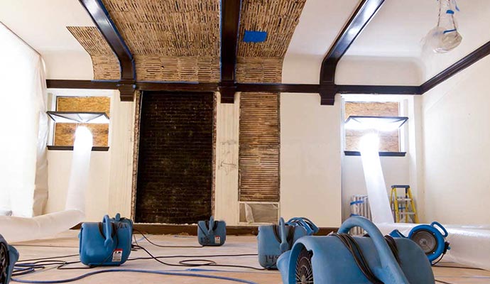 Water damage restoration with equipment